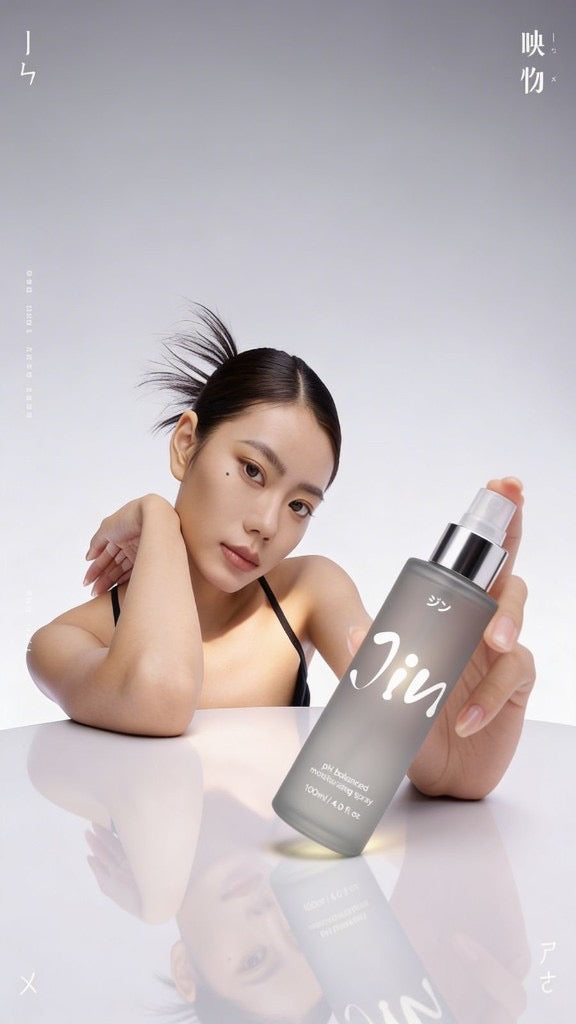 Jin model holding Prana Rose Mist